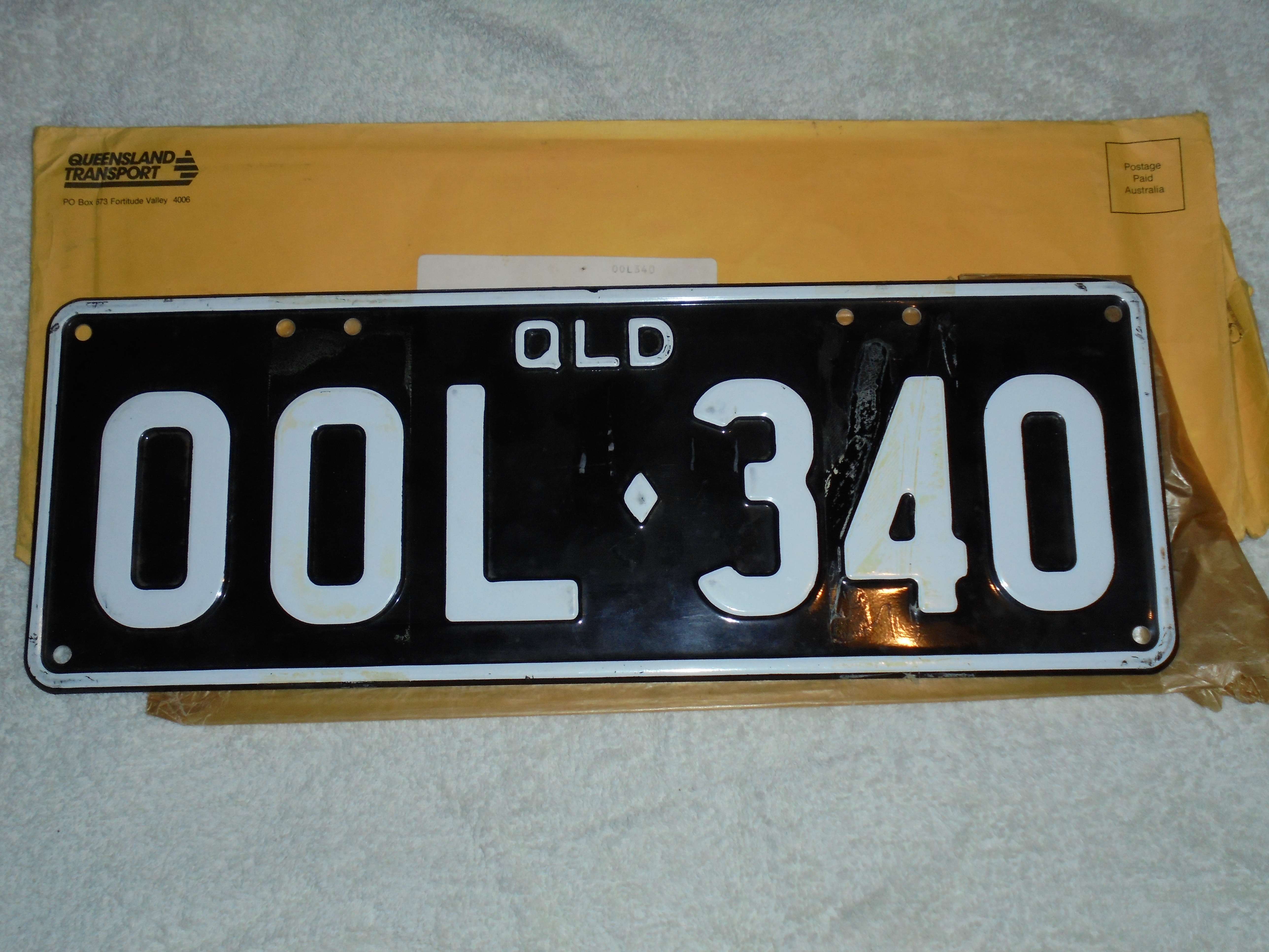 00X-002 New QLD Black & White Legal Number Plates