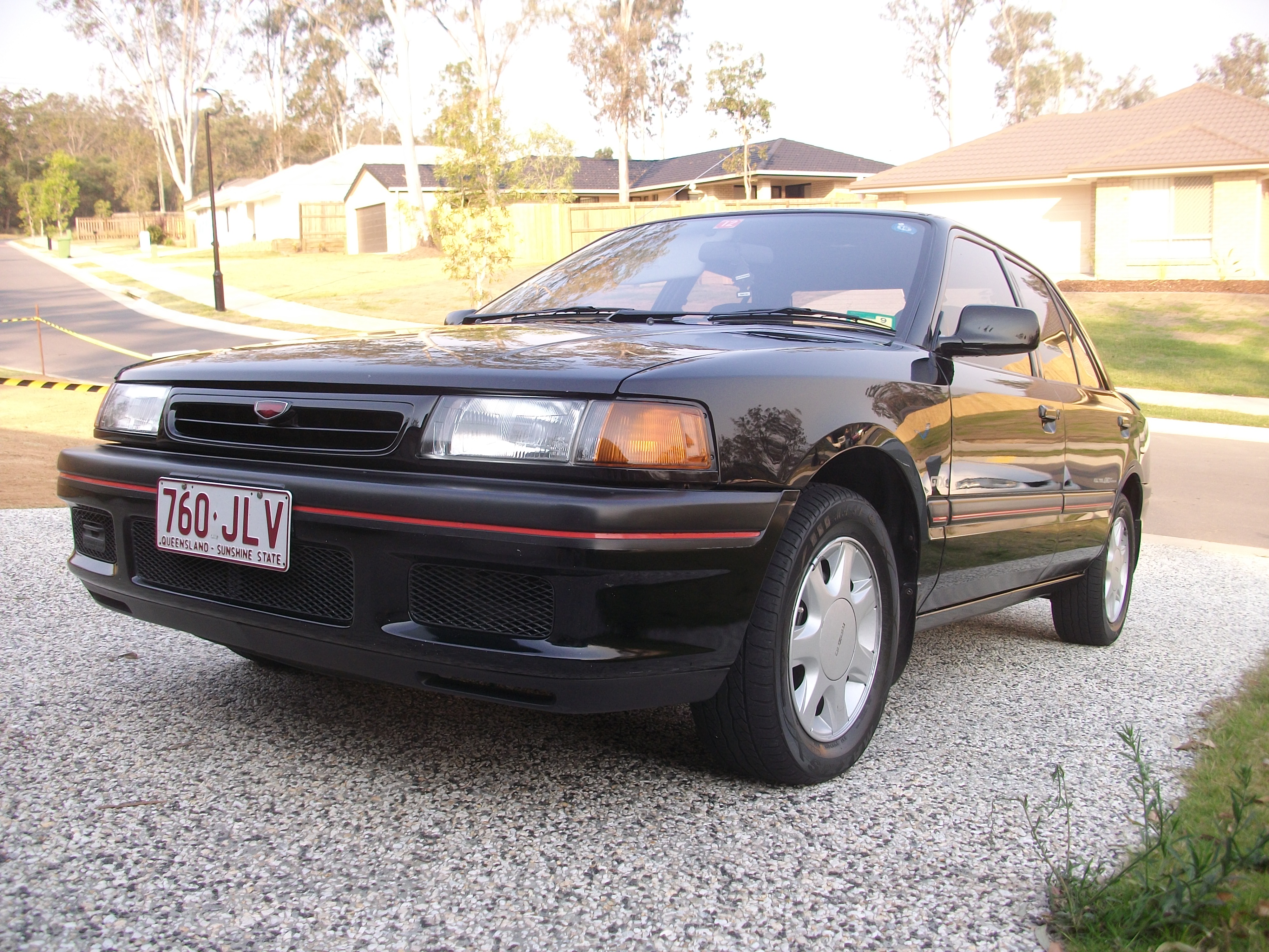 Mazda familia тюнинг
